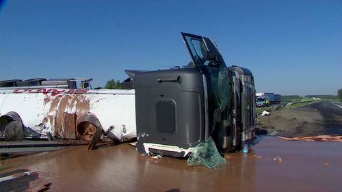 Liquid chocolate spill from truck accident leaves Polish highway a sticky mess. (AP)
