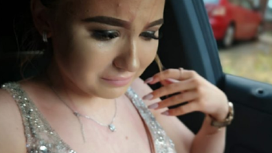 The girl had juice tipped on her at her prom