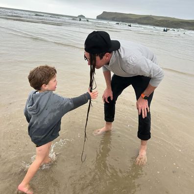Princess Eugenie shared this snap of son August playing with husband Jack Brooksbank by the sea.