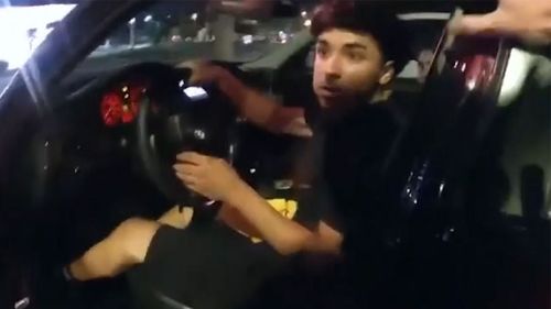 When the teen's car went into reverse, the officer opened fire.