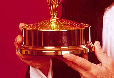 Who holds the record for hosting the Emmy Awards with five?