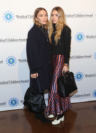 Mary-Kate and Ashley Olsen at the 2014 World Of Children Awards in New York, both wearing their label The Row, in November, 2014