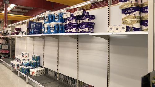 Toilet paper shelves emptied in Sydney supermarket.