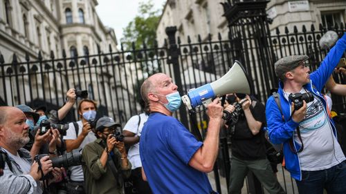 Healthcare workers take part in a protest over pay conditions in the NHS on August 8, 2020 in London, United Kingdom