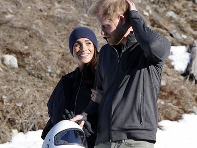 Meghan Markle and Prince Harry walk in the snow at Invictus Games Vancouver Whistlers 2025's One Year To Go Winter Training Camp.