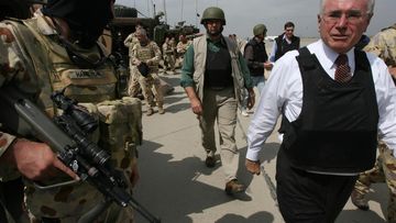 Then-Australian prime minister John Howard pays a surprise visit to Baghdad, Iraq in 2007. 