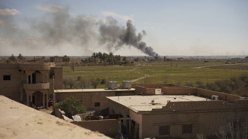 Columns of black smoke billow from the last small piece of territory held by Islamic State militants as US-backed fighters pounded the area with artillery fire and occasional airstrikes in Baghouz, Syria.