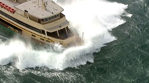 Wild winds in Sydney made the harbour choppy for the ferry. (9NEWS)