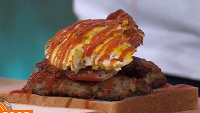 Brooklyn Beckham makes a bacon, sausage and egg sandwich during a cooking segment on the US Today Show