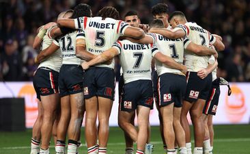 Roosters players huddle after a Storm try during the NRL Preliminary Final match between the Melbourne Storm and Sydney Roosters at AAMI Park on September 27, 2024 in Melbourne, Australia. (Photo by Cameron Spencer/Getty Images)