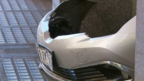 The impact of the crash left the silver vehicle with significant damage to the front bumper.