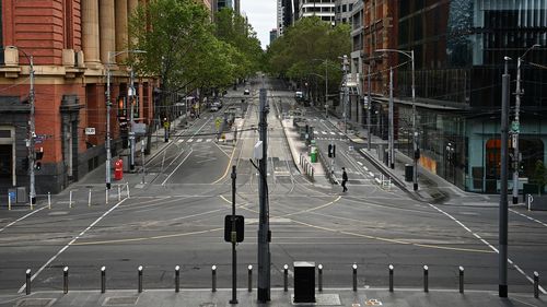 Uma rua Bourke vazia durante um dos bloqueios de maratona de Melbourne.