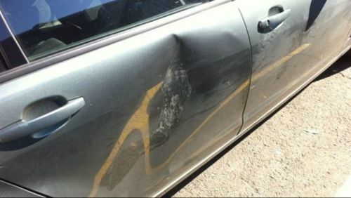 The car had its windscreen smashed and multiple panels were damaged. (Supplied: NSW Police)