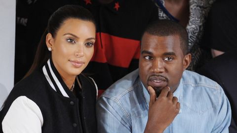 Kimye family values! Kanye 'proposes' to new baby mama Kim