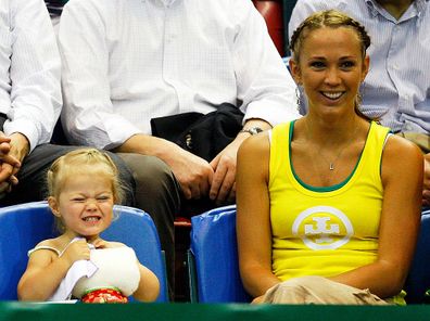 Bec Hewitt and daughter Mia Hewitt watch the action during day one of the Davis Cup tie between Australia and Thailand April 11, 2008 in Townsville.