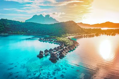 View from above at sunset of paradise getaway Bora Bora, French Polynesia, Tahiti, South Pacific Ocean.