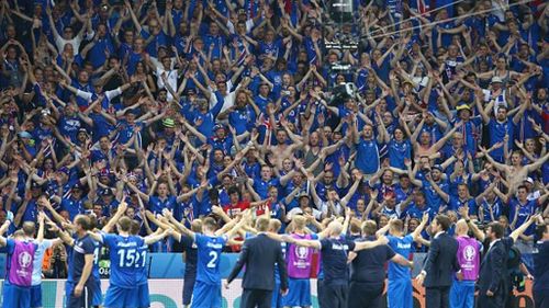 Fans and players celebrate. (Twitter / @UEFAEURO)