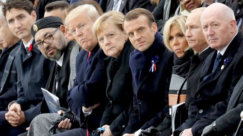 Canadian Prime Minister Justin Trudeau, Moroccan King Mohammed VI, US President Donald Trump, German Chancellor Angela Merkel, French President Emmanuel Macron and his wife Brigitte Macron, Russian President Vladimir Putin and Australian Governor-General Peter Cosgrove.