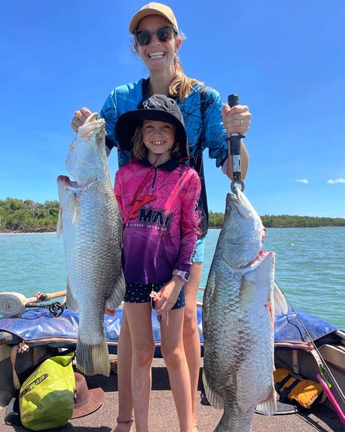 Emma Jeppesen and her daughter Zoey enjoy the spoils of a good day's fishing.