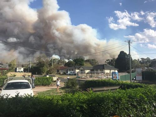The bushfire came within metres of homes in Menai. (Luke Cooper)