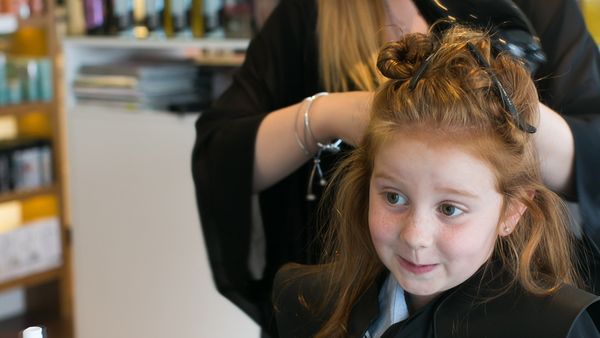 Pint-size hair accessory designer Pixie Curtis gets styled for back-to-school. Image: Parker Blain.