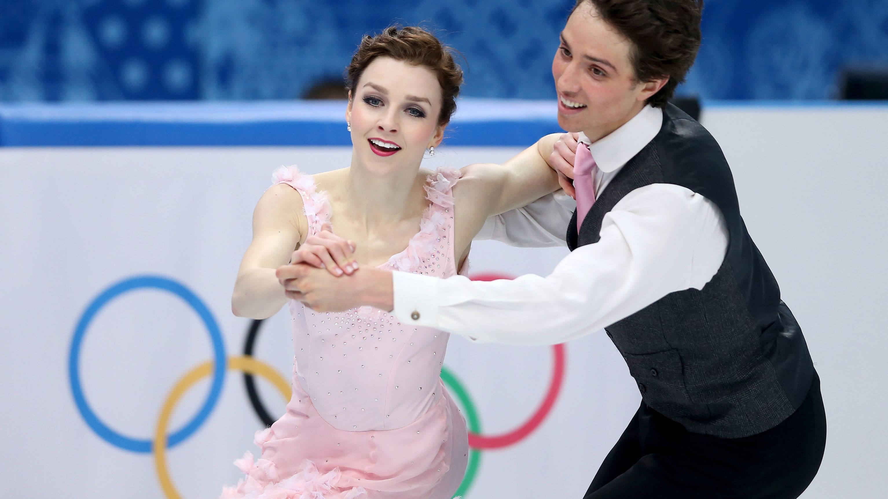 Alexandra Paul and Mitchell Islam of Canada compete at the Sochi 2014 Winter Olympics.