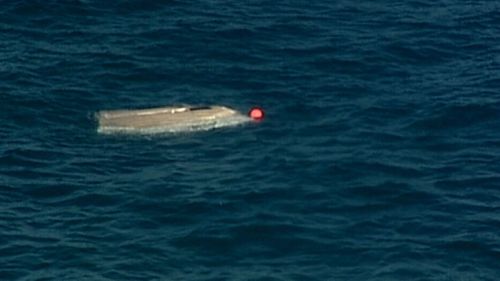 A man is being treated after his boat capsized off Sydney’s Royal National Park.

