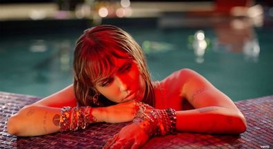 Miley Cyrus is the music video for Slide Away