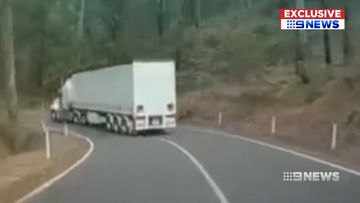A truck driver has been filmed swerving onto the wrong side of the road.