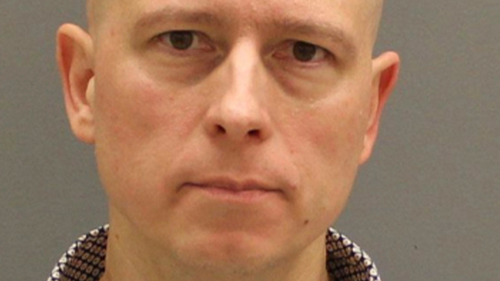 Timothy Koets, 50, an assistant professor for Grand Rapids Community College, has been sentenced in the pool drowning of his son with autism. (Ottawa County Jail booking photo)