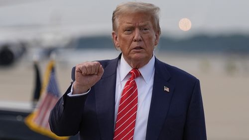 President Donald Trump gestures after arriving on Air Force One, Wednesday, June 25, 2025, at Joint Base Andrews, Md. (AP Photo/Alex Brandon)