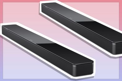 9PR: Bose Smart Soundbar 700: Premium Bluetooth Soundbar with Alexa Voice Control Built-in in Black on a pink and purple background.