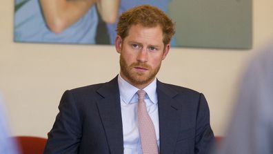 Britain's Prince Harry takes part in a round table discussion with HIV doctors at King's College Hospital in south London.