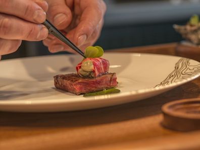 Oncore by Clare Smyth plating food