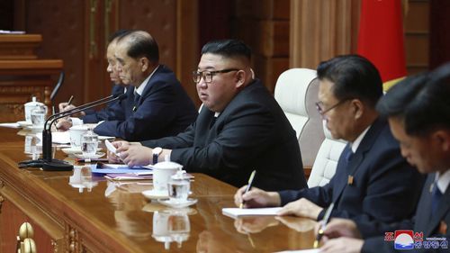 In this photo provided by the North Korean government, North Korean leader Kim Jong Un attends a ruling party meeting in Pyongyang, North Korea, Thursday, Aug. 13 2020. 