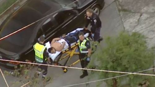 Man arrested after allegedly stabbing three people sparking Melbourne siege