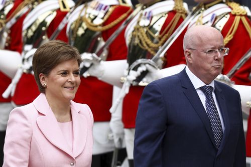 Scotland's First Minister Nicola Sturgeon and her husband and current chief executive officer of the Scottish National Party Peter Murrel arrive for a service of thanksgiving for the reign of Queen Elizabeth II at St Paul's Cathedral in London on June 3, 2022.