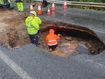 Sinkhole causes traffic chaos for community battered by natural disasters