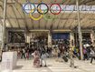 Olympic rings are seen as visitors walk at the Gare du Nord station on July 19, 2024 in Paris, France. 