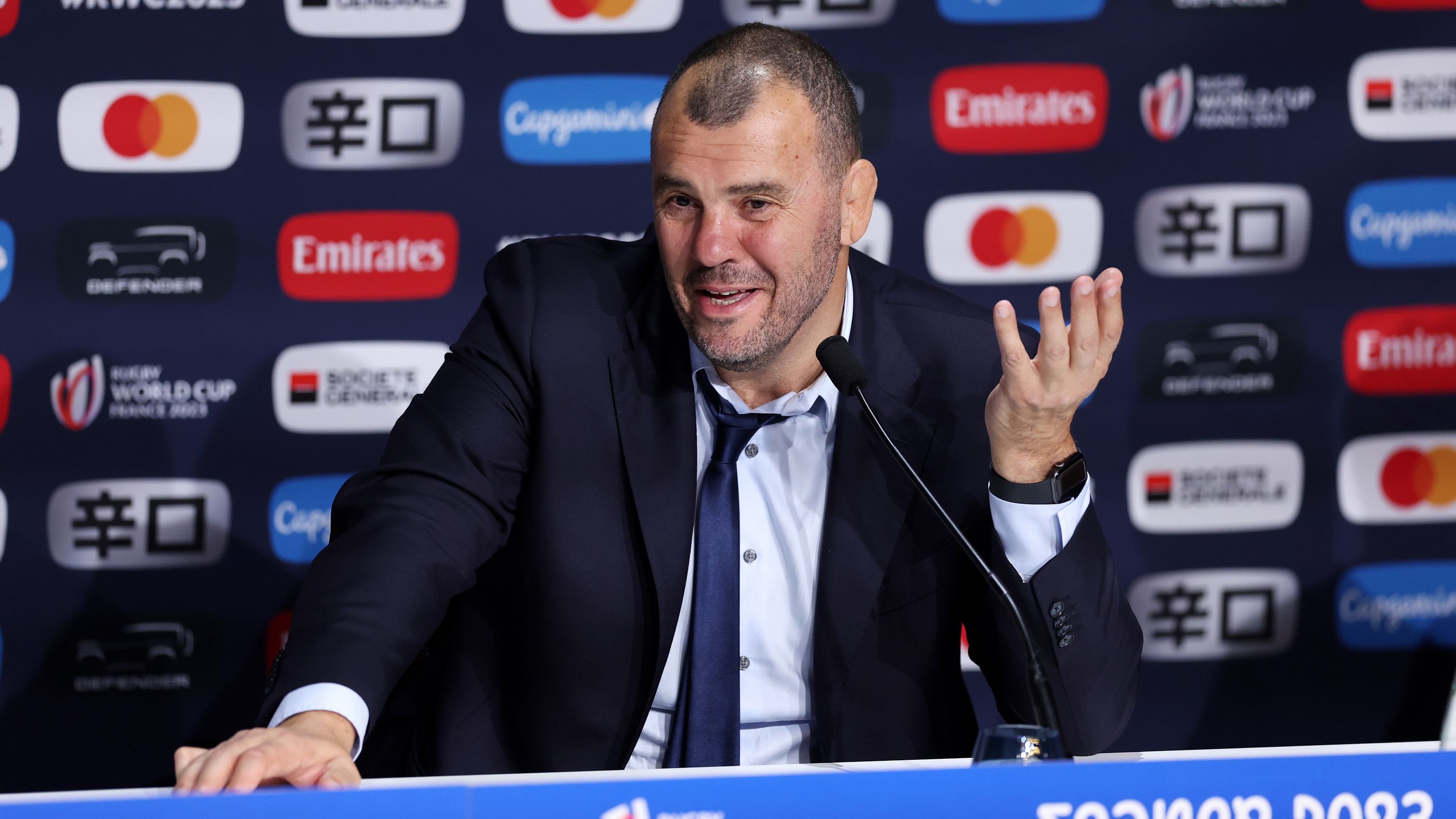 Michael Cheika speaks to the media at Stade de France.