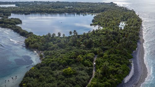 A tourist buggy carries passengers through Koattey and Eydhigali Kilhi wetlands.