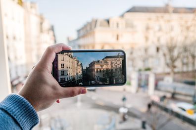 A smartphone showing a city street