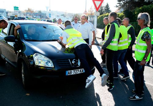 A protester has been killed and 47 others injured during roadblocks set up around France to demonstrate against rising fuel taxes.