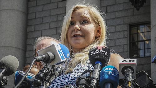 Virginia Roberts Giuffre holds a news conference outside a Manhattan court following the jailhouse death of Jeffrey Epstein, Aug. 27, 2019