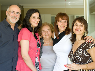 Rachelle Unreich (second left) with her half-siblings and mother Mira (centre).
