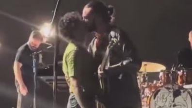 Matty Healy kissing bandmate Ross MacDonald in Malaysia 