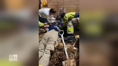 Rescuers sang along with the moves to help ease the child's nerves while being rescued from a drain she spent an hour stuck in.