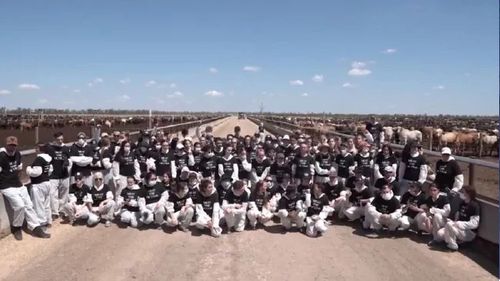 The activist group posed for a group shot following the ambush. 