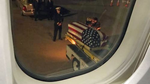 Plane passengers reduced to tears as weeping parents meet daughter's casket