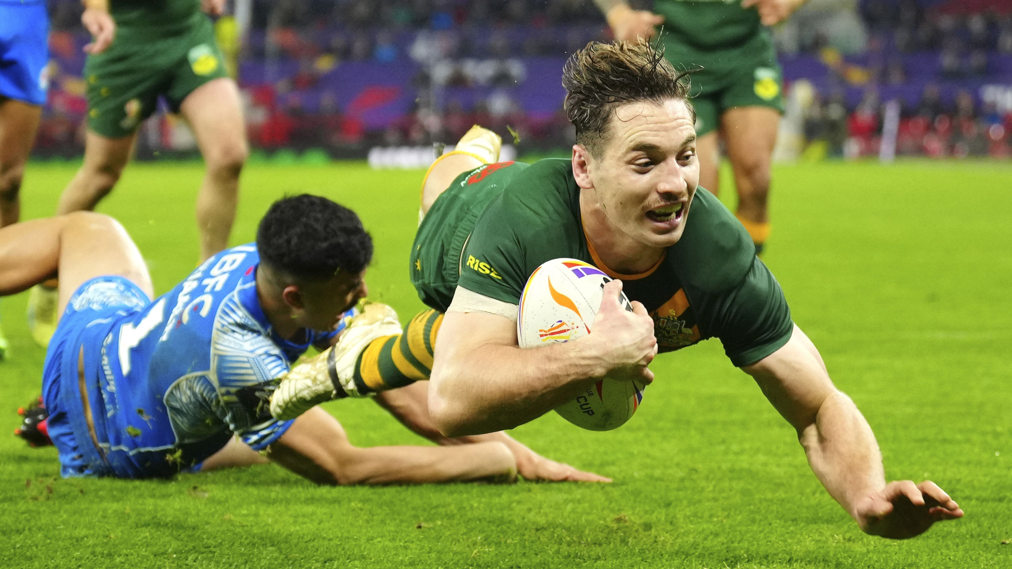Australia&#x27;s Cameron Murray scores a try during the Rugby League World Cup final match between Australia and Samoa.